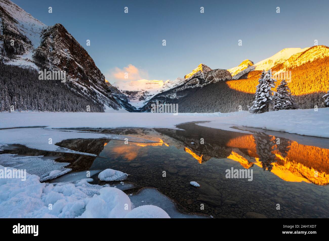 Lake Louise with reflections in Winter, Banff National Park, Alberta, Canada, Stock Photo