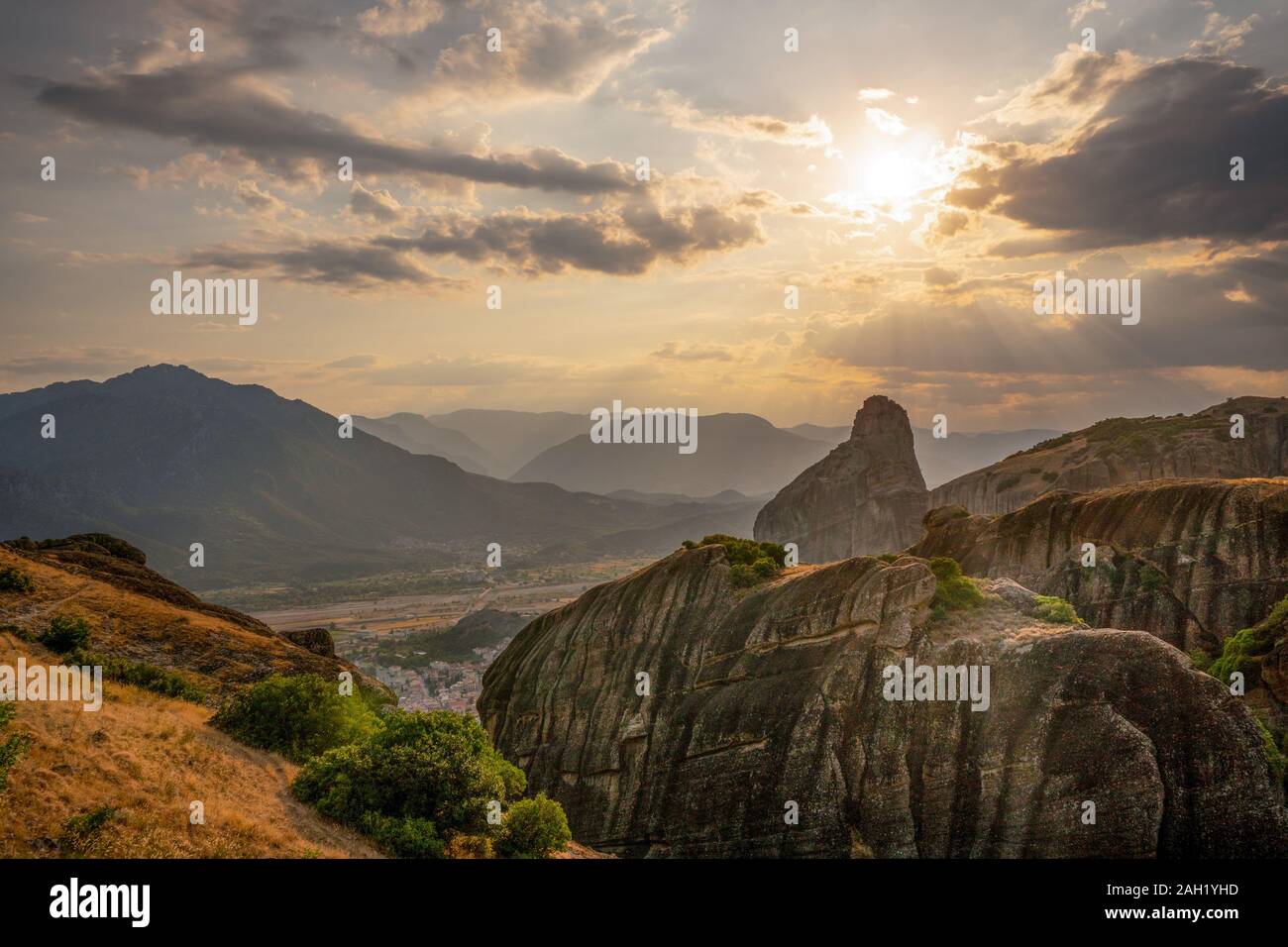 City and mountains in the evening in Greece horizontal Stock Photo