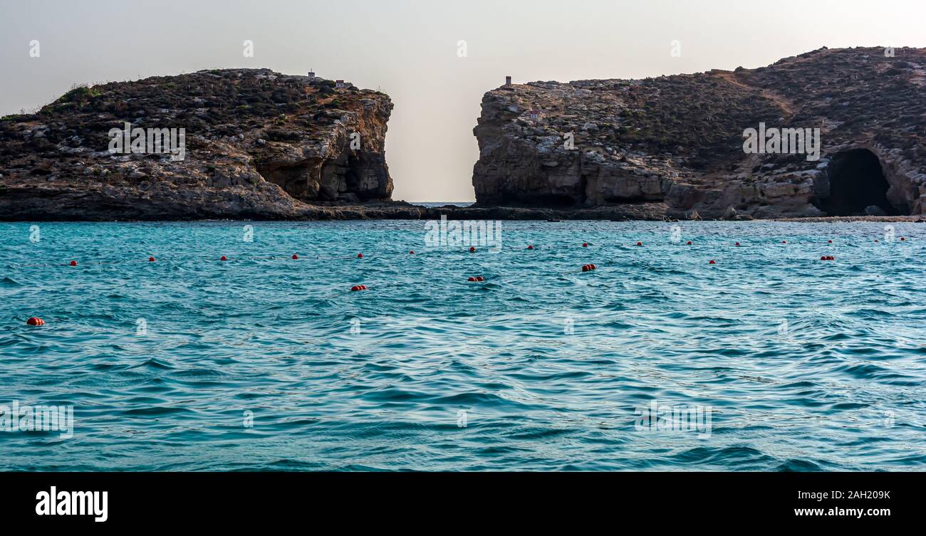 The Blue Lagoon with Cominotto island in background Stock Photo