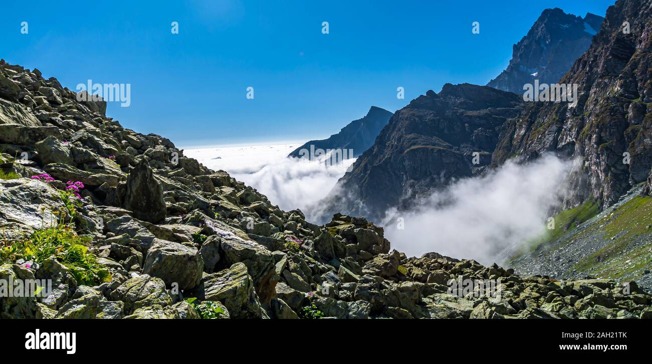 Hiking around Monviso: unique scenarios, mountains and enchanting landscapes, suggestive sunrise and sunset Stock Photo