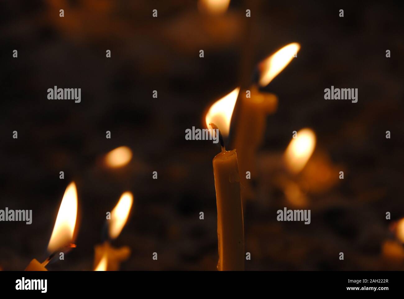 White candles burning for relax and pray Stock Photo Alamy