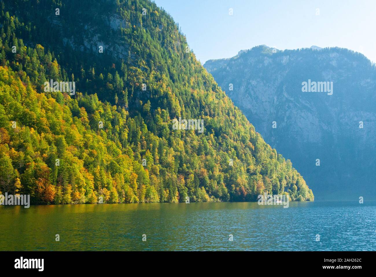 reflection of hills in koenigsee, autumn time in Bavaria Stock Photo