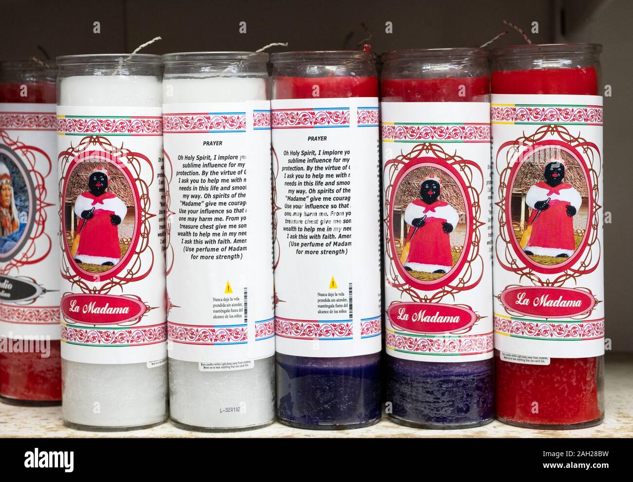 Spiritual religious scented candles for sale at Candalaria Botanica, a