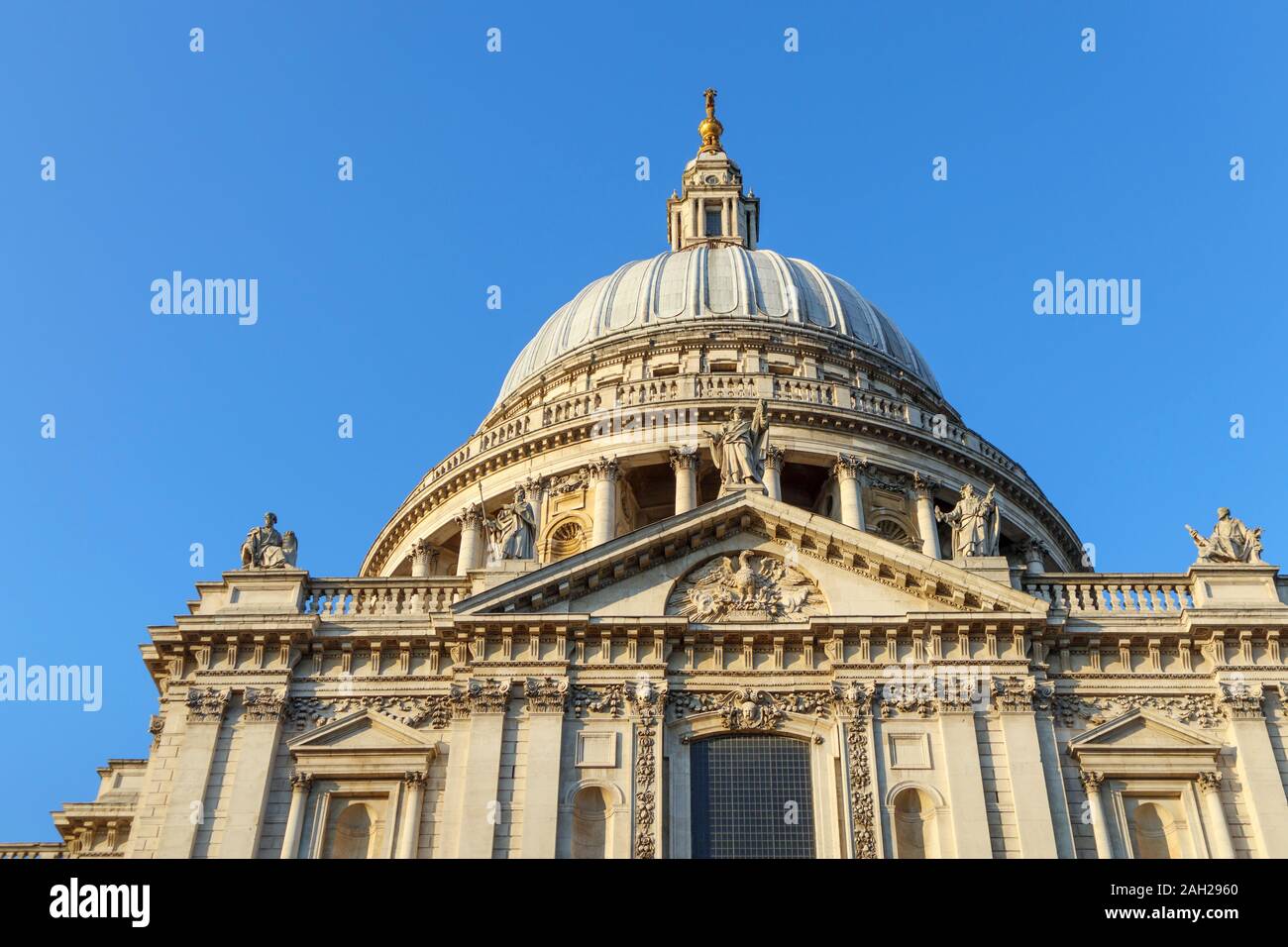 View of the iconic London landmark, historic St Paul's Cathedral with its dome designed by Sir Christopher Wren, on a sunny autumn day Stock Photo