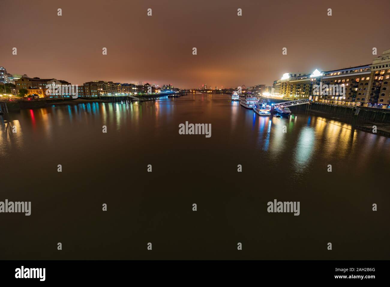 View of the Butler's Wharf at night from the Tower bridge, London, England, UK, GB Stock Photo