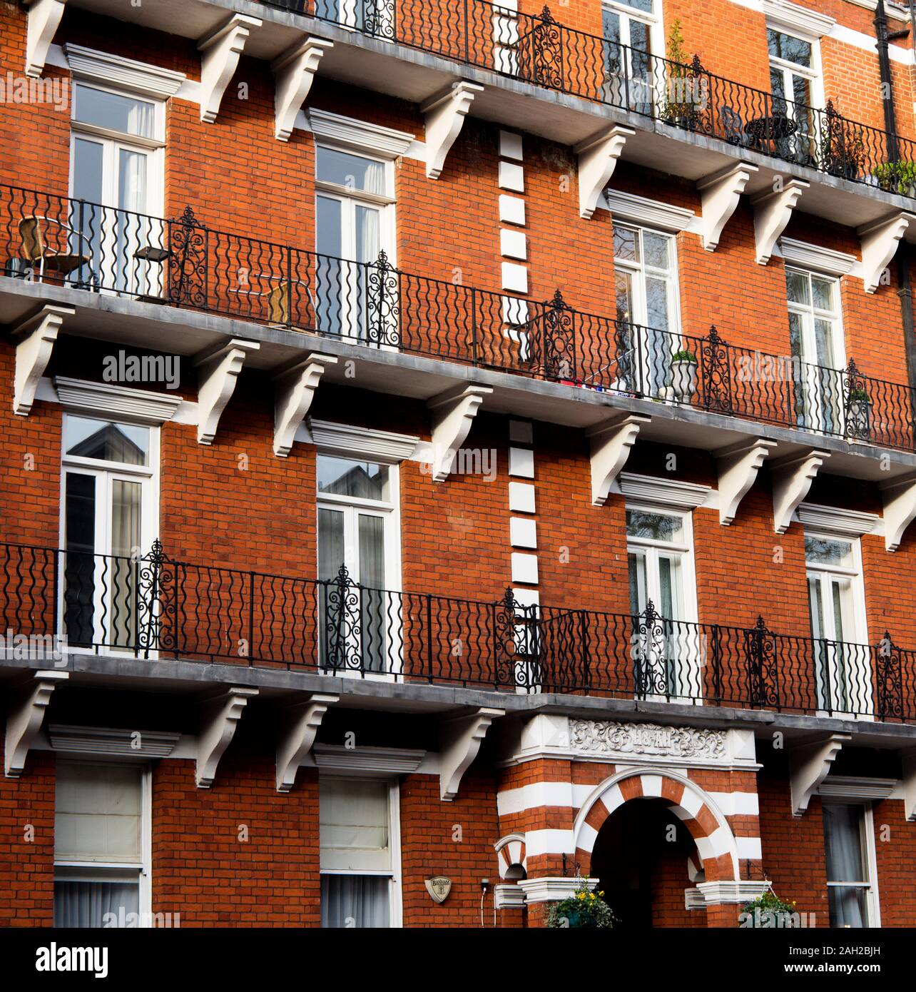Red brick mansion block on Old Brompton Road, Kensington, London Stock