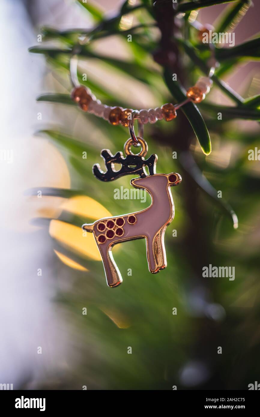 Reindeer tree decoration hanging on a Christmas tree Stock Photo