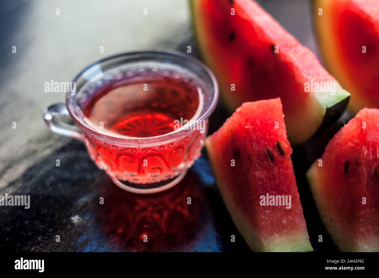 Mouth Watering Watermelon Tea In A Transparent Glass Cup On Wooden Surface With Watermelon Pieces In Triangle Shape Stock Photo Alamy