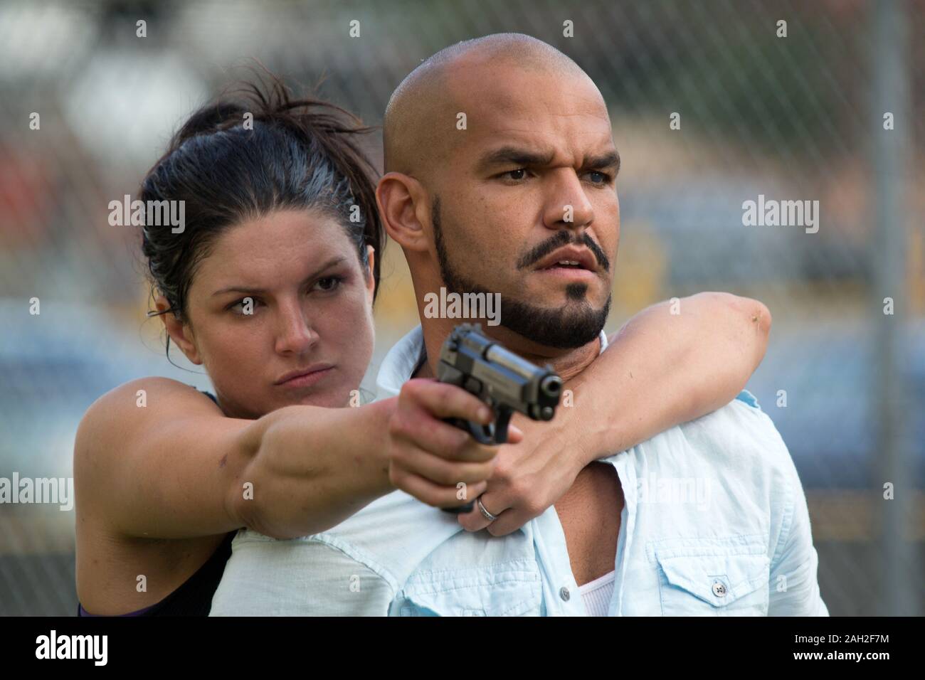 AMAURY NOLASCO and GINA CARANO in IN THE BLOOD (2014), directed by JOHN STOCKWELL. Credit: ANCHOR BAY FILMS / Album Stock Photo