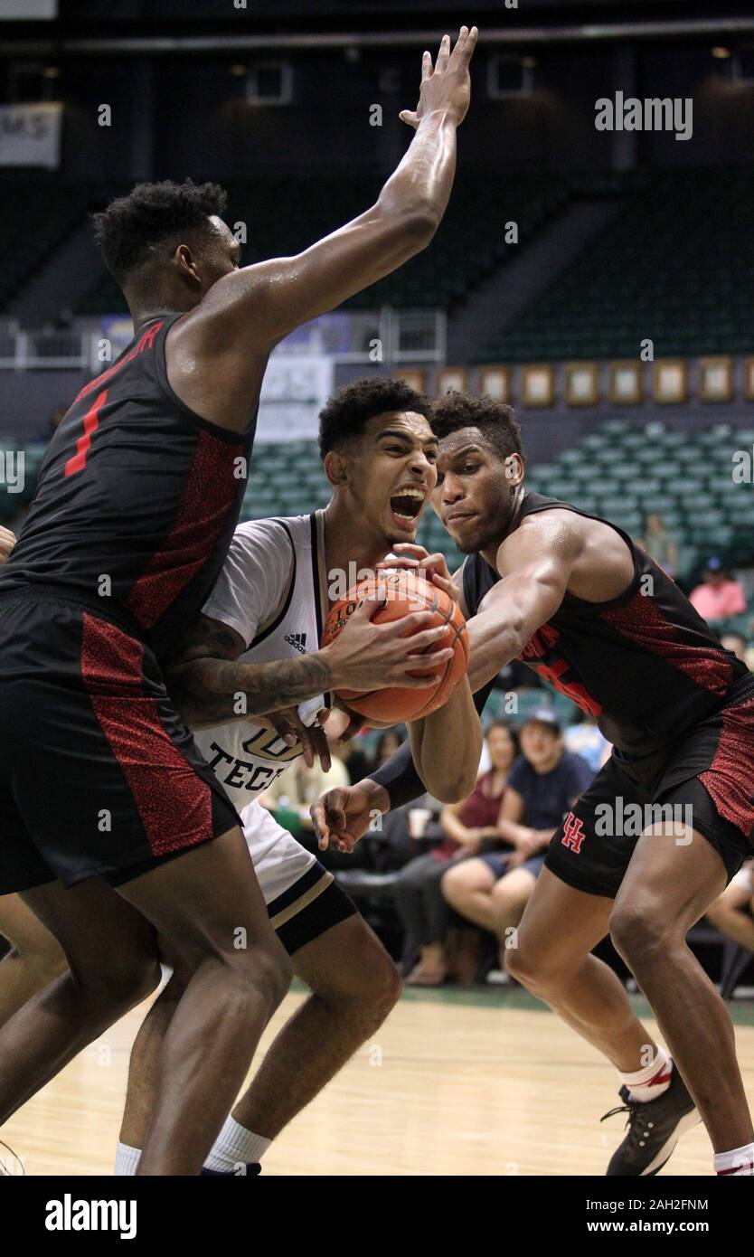 Honolulu, Hawaii. December 23, 2019 - Georgia Tech Yellow Jackets guard Michael Devoe (0) drive the lane through some heavy traffic during a game at the Diamond Head Classic between the Houston Cougars and the Georgia Tech Yellow Jackets at the Stan Sheriff Center in Honolulu, HI - Michael Sullivan/CSM Credit: Cal Sport Media/Alamy Live News Stock Photo