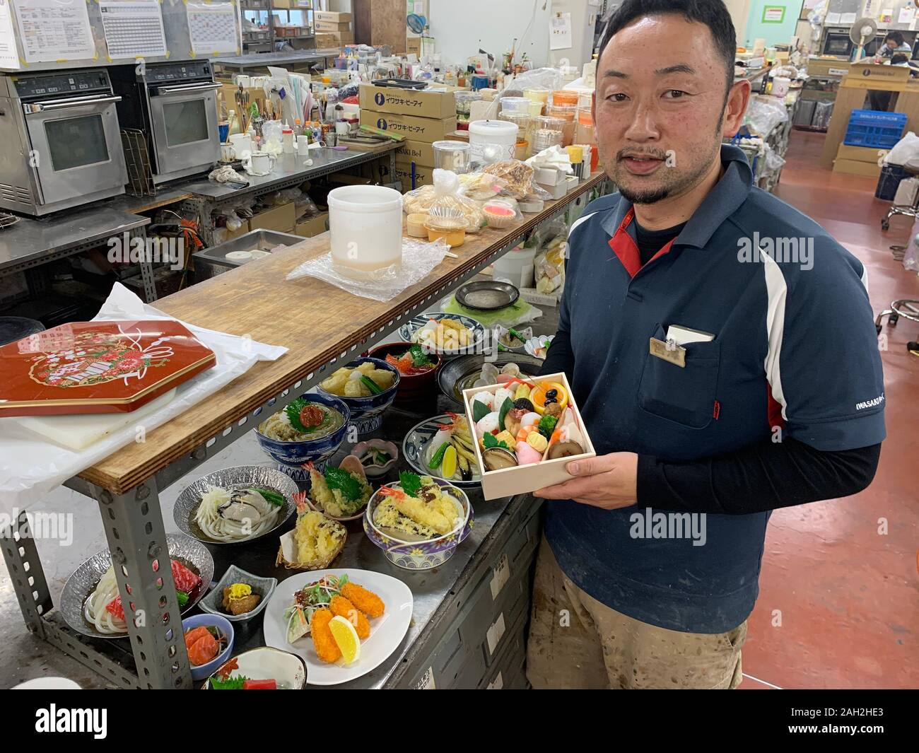 Yokohama, Japan. 11th Dec, 2019. Factory manager Hiroaki Miyazawa shows
