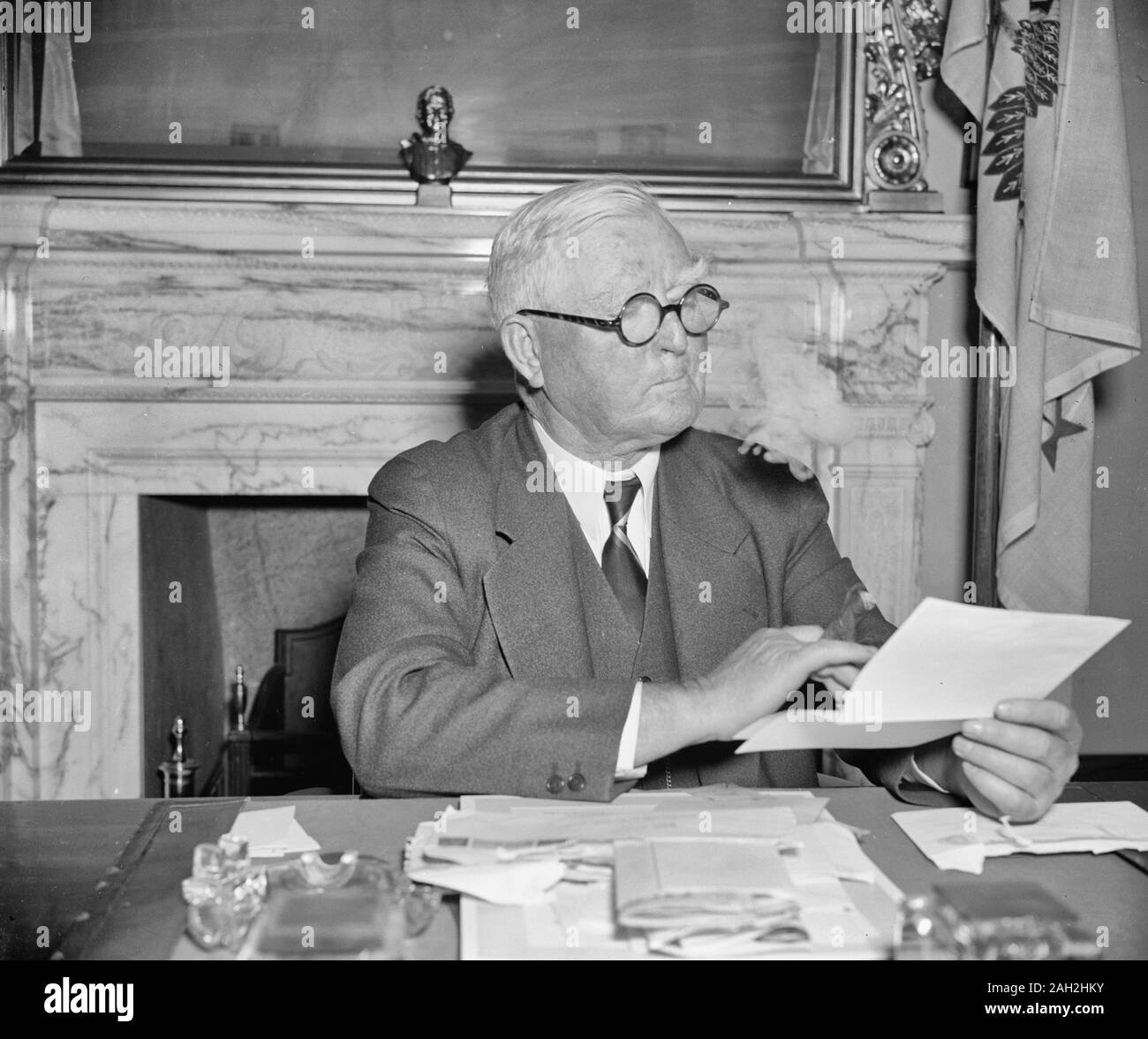 V.P. Garner back on the job. Washington, D.C., Dec. 17. Fully rested from a 6-months vacation at his home in Texas, Vice President John N. Garner returned to his desk at the Capitol today. A conference with President Roosevelt was the highlight of his program today, 12/17/38 Stock Photo