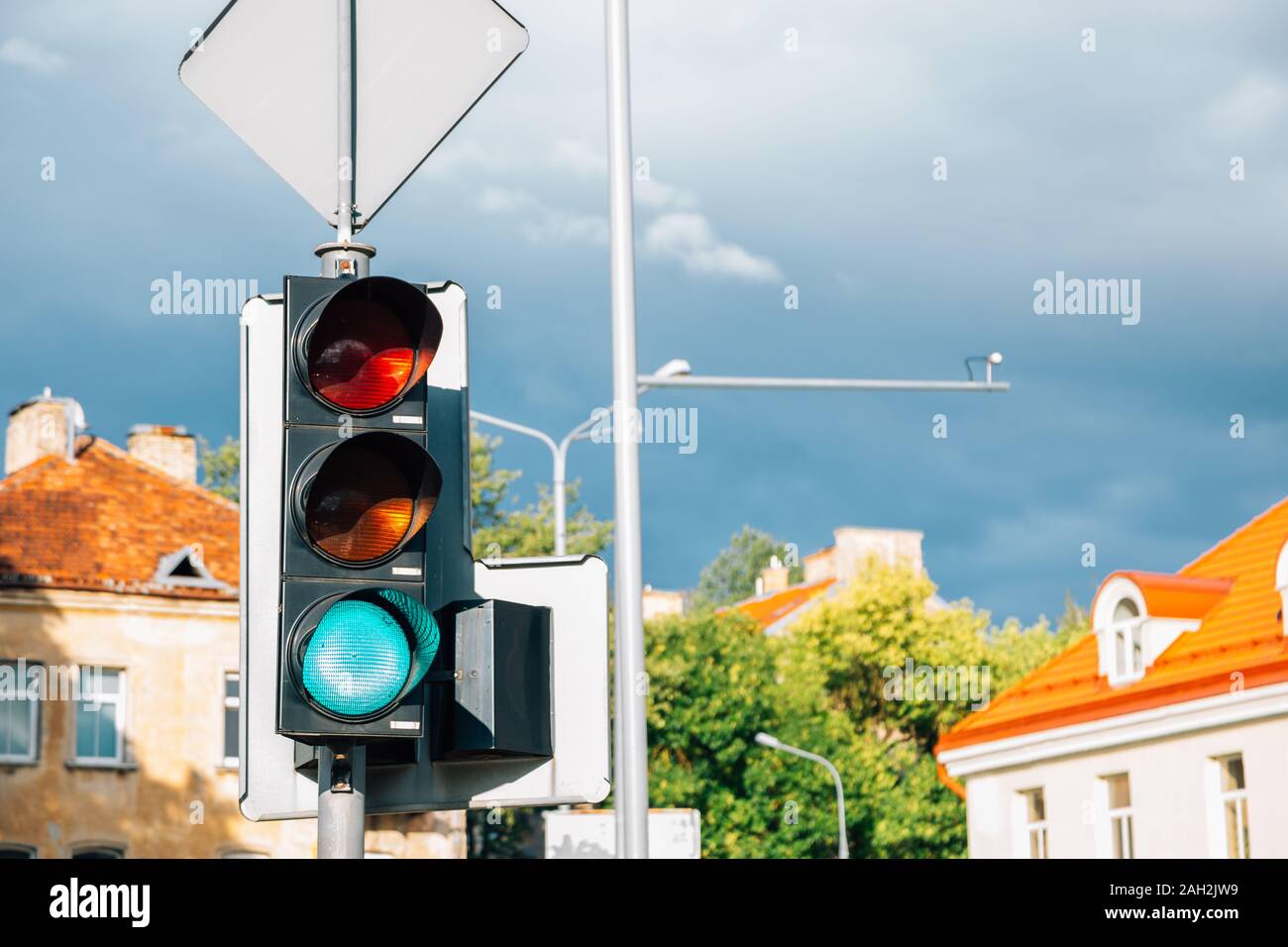 Traffic light at old town in Lithuania Stock Photo -