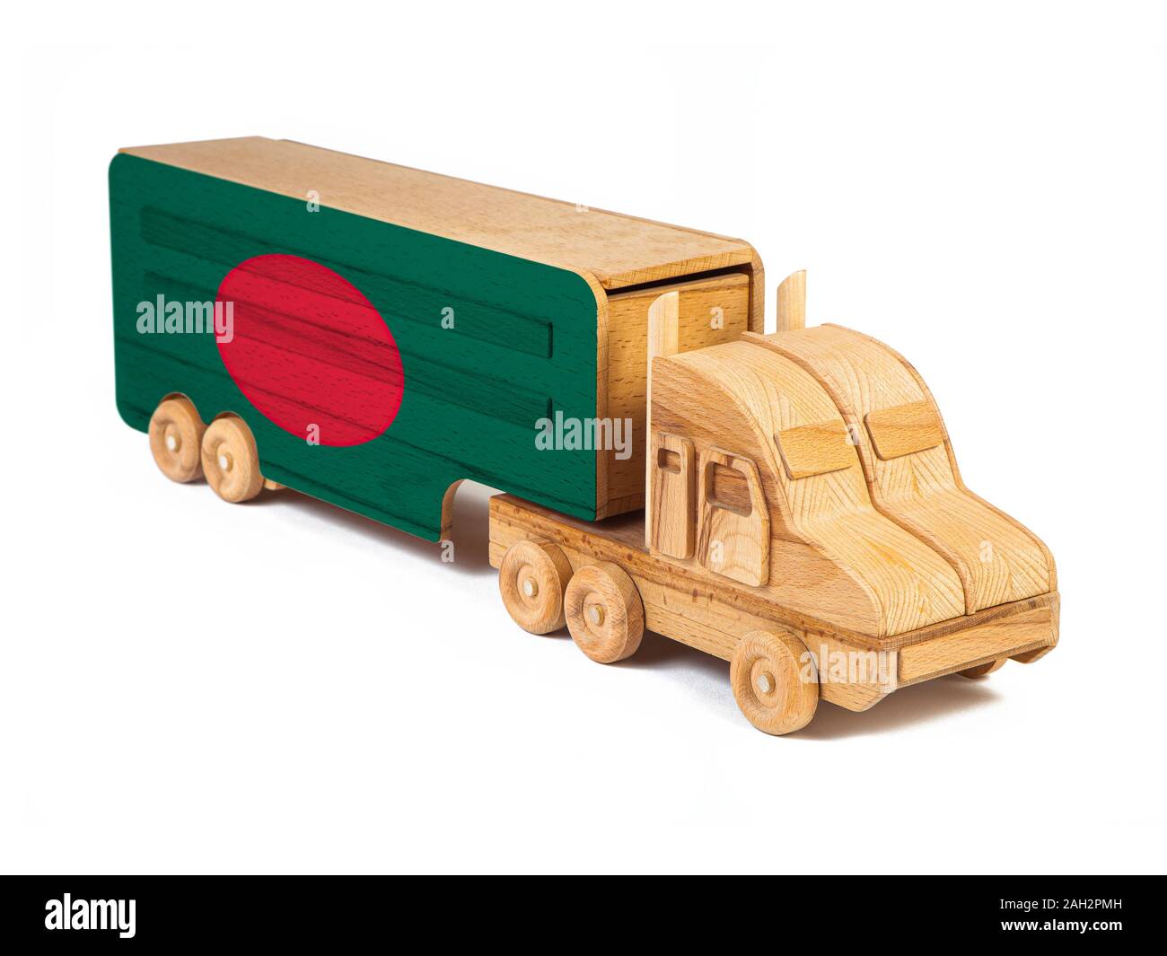 Close-up of a wooden toy truck with a painted national flag Bangladesh. The concept of export-import,transportation, national delivery of goods Stock Photo