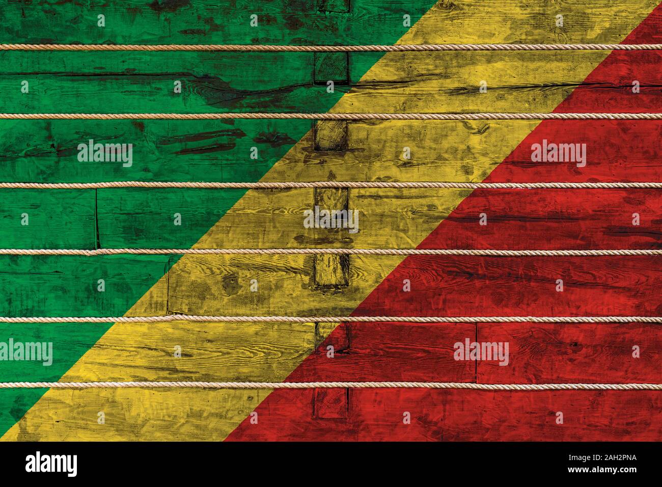 National flag of Republic of the Congo on a wooden wall background. The ...