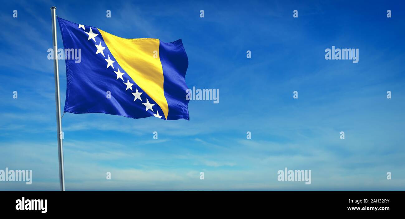 The National flag of Bosnia and Herzegovina blowing in the wind in ...