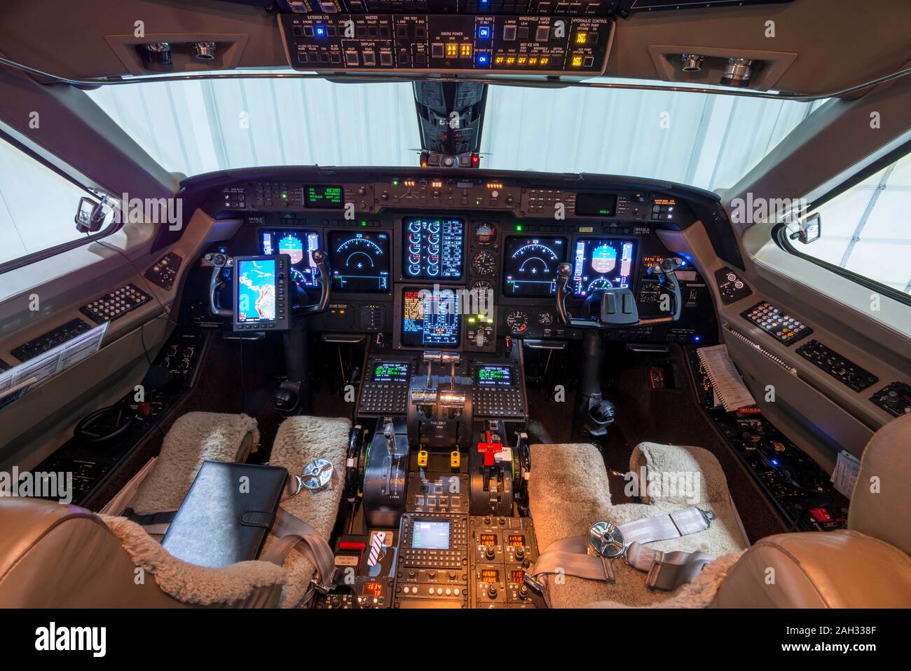Private jet Aircraft cockpit instrument panel, close-up Stock Photo