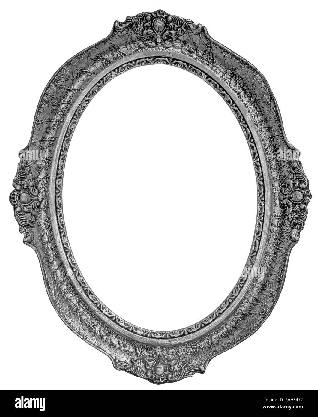 Old wooden silver plated oval Frame Isolated on white background Stock Photo
