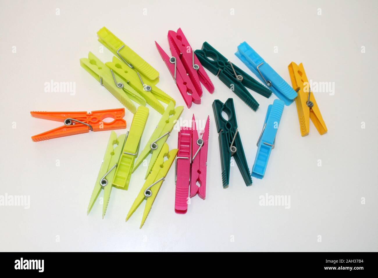 Clothespins on a white background as a Christmas tree Stock