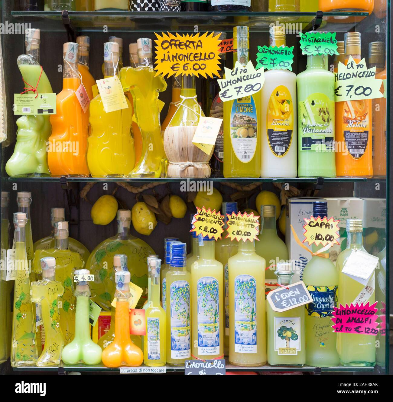 Limoncello liquor in souvenir bottles on display, Italy Stock Photo Alamy