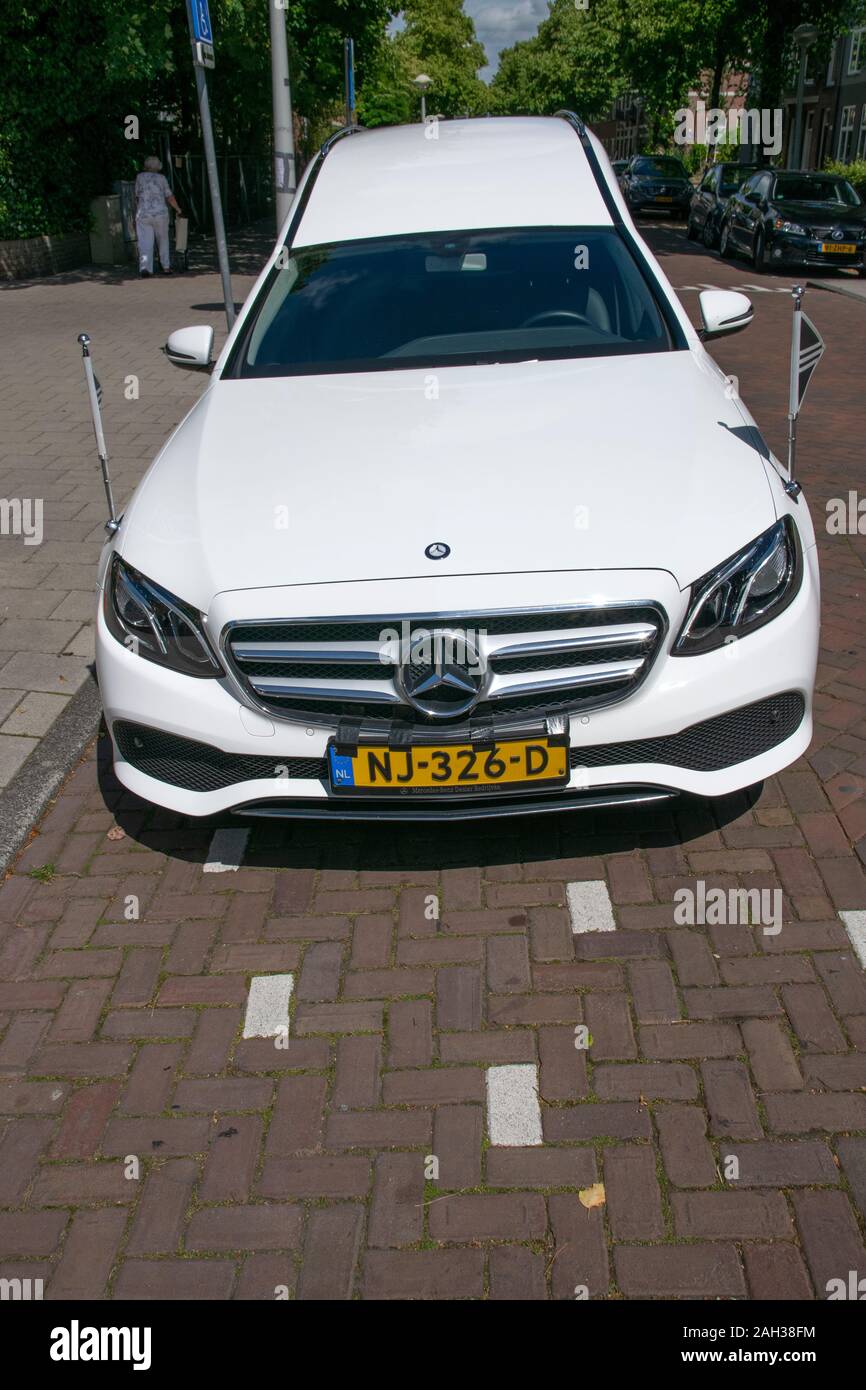White MercedesBenz Funeral Car At Amsterdam The Netherlands 2019 Stock