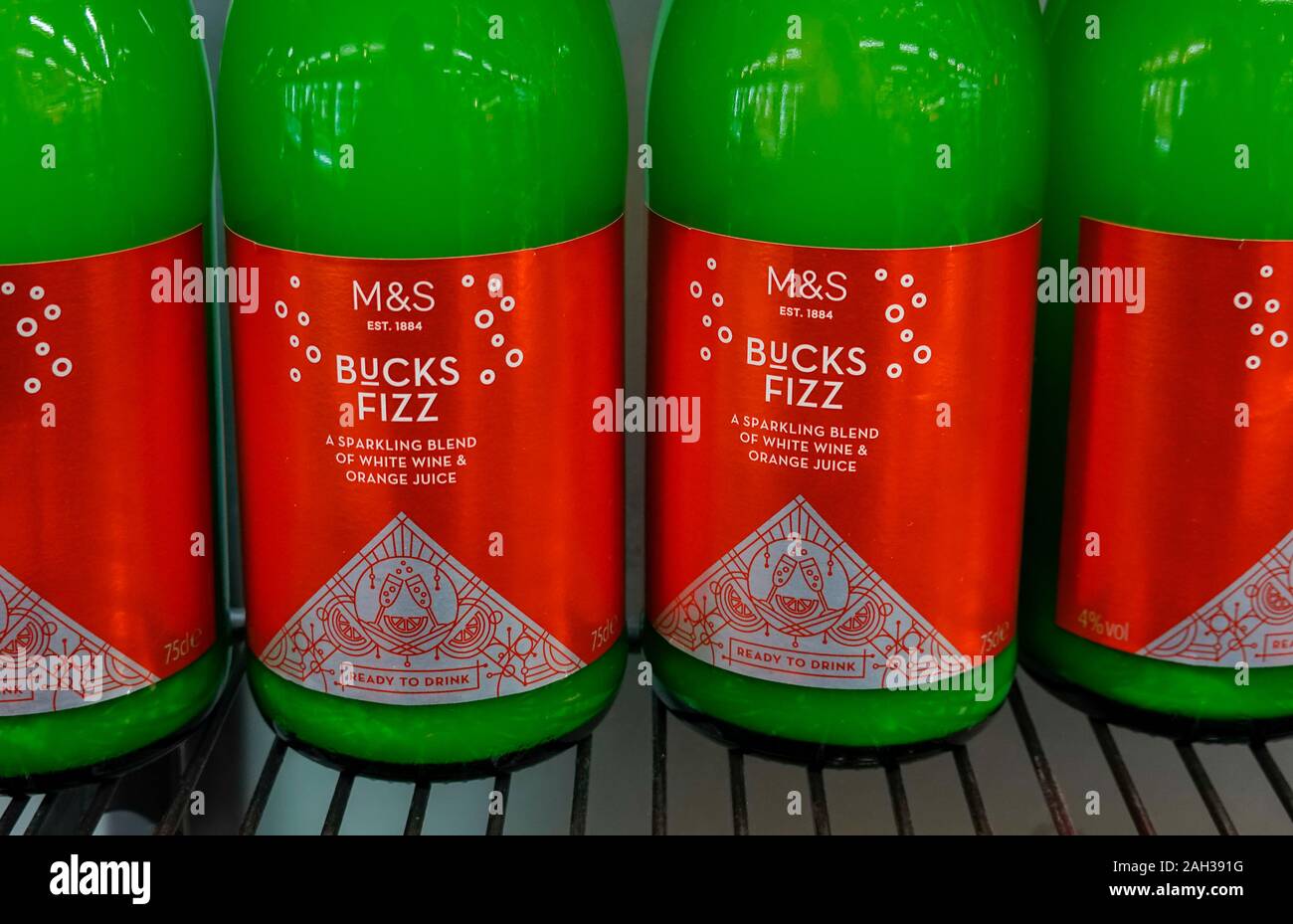 Bottles of Buck's Fizz on an M&S shelf in the UK Stock Photo