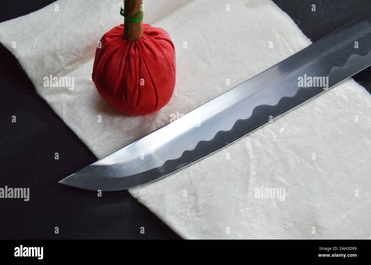 Katana Japanese sword blade and scabbard with red compress for cleaning