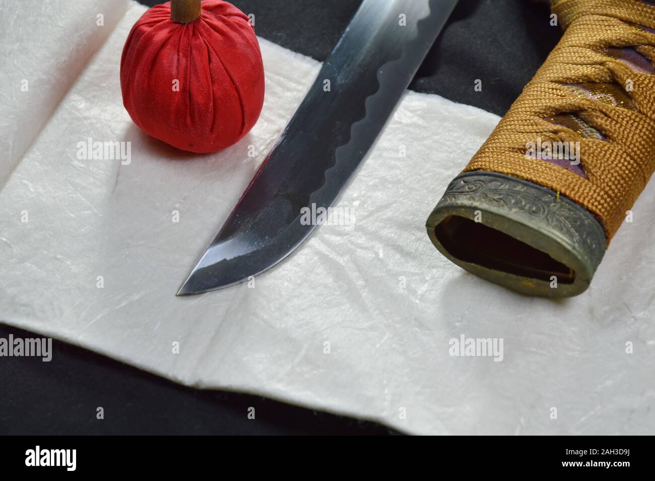 Katana Japanese sword blade and scabbard with red compress for cleaning