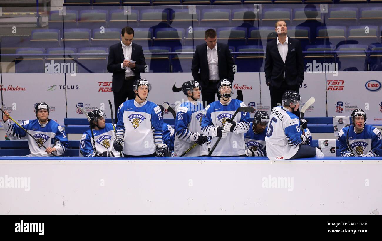 Head Coach Raimo Helminen (FIN), center, at bench during a preliminary  match between Canada and Finland prior to the 2020 IIHF World Junior Ice  Hockey Championships, in Ostrava, Czech Republic, on December