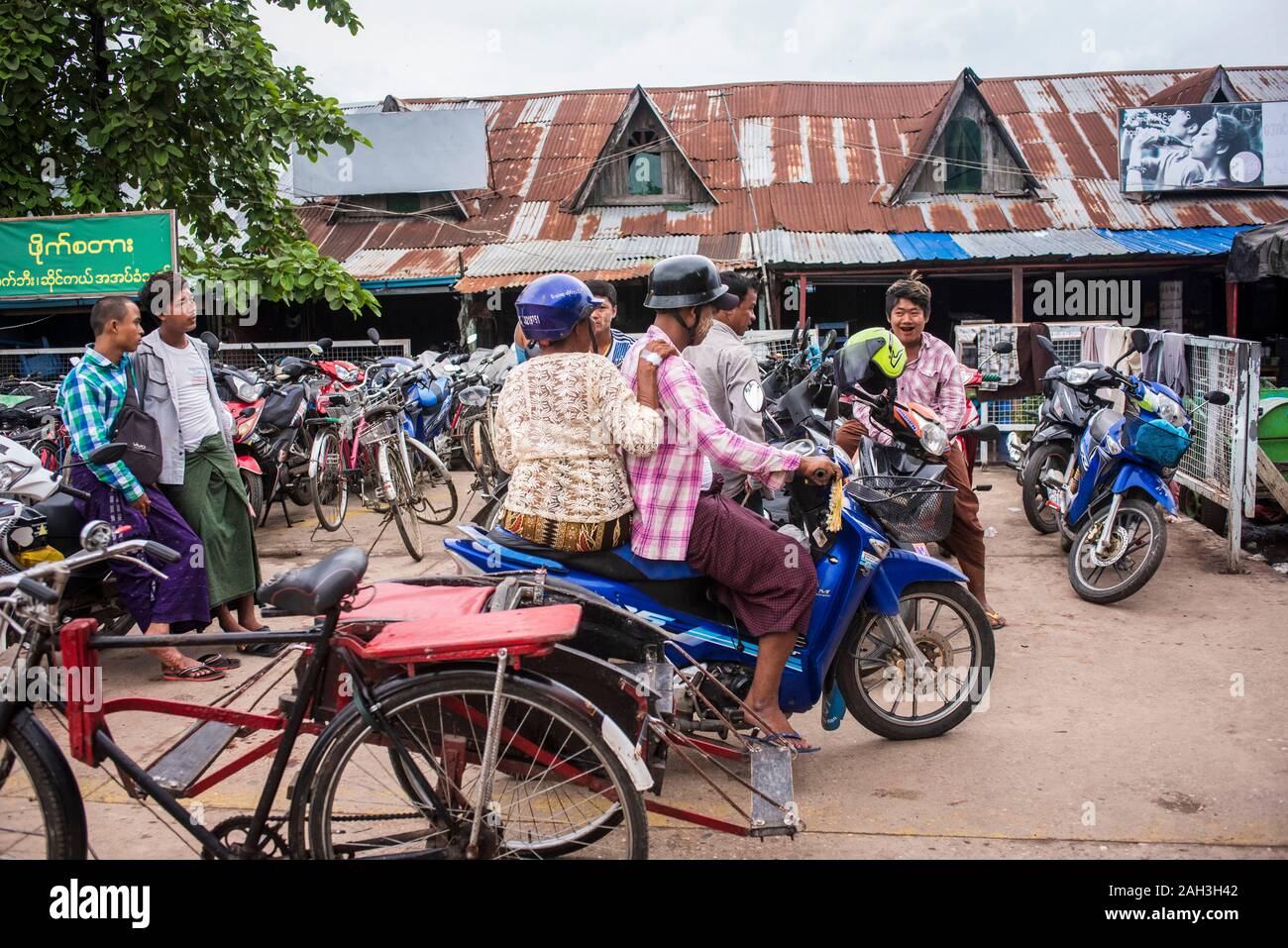Dala, Myanmar with motorcycle transportation at ferry terminal Stock Photo