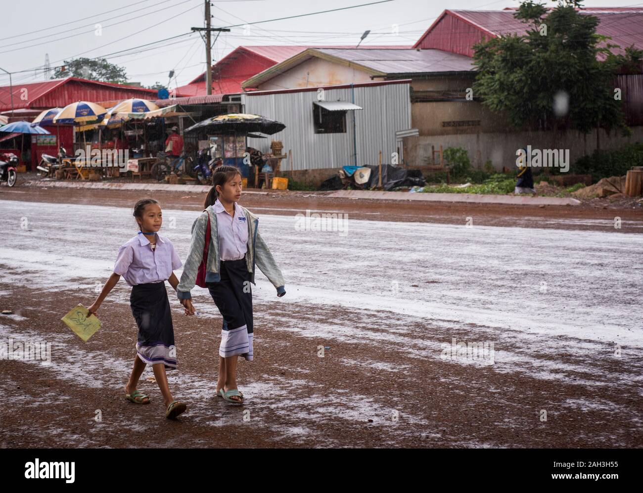 Laongam, Laos, two girls walking to school Stock Photo