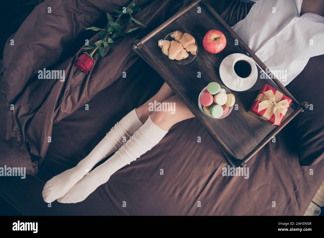 Cropped top above high angle view of nice attractive girl sitting on