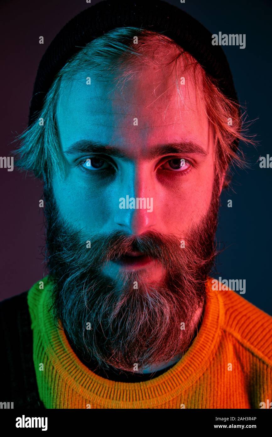 Serious, close up. Caucasian man's portrait on gradient studio ...