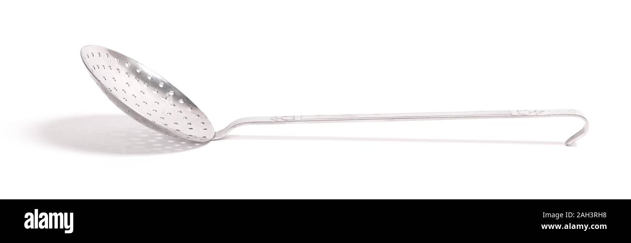 Old metal colander isolated on white background Stock Photo - Alamy