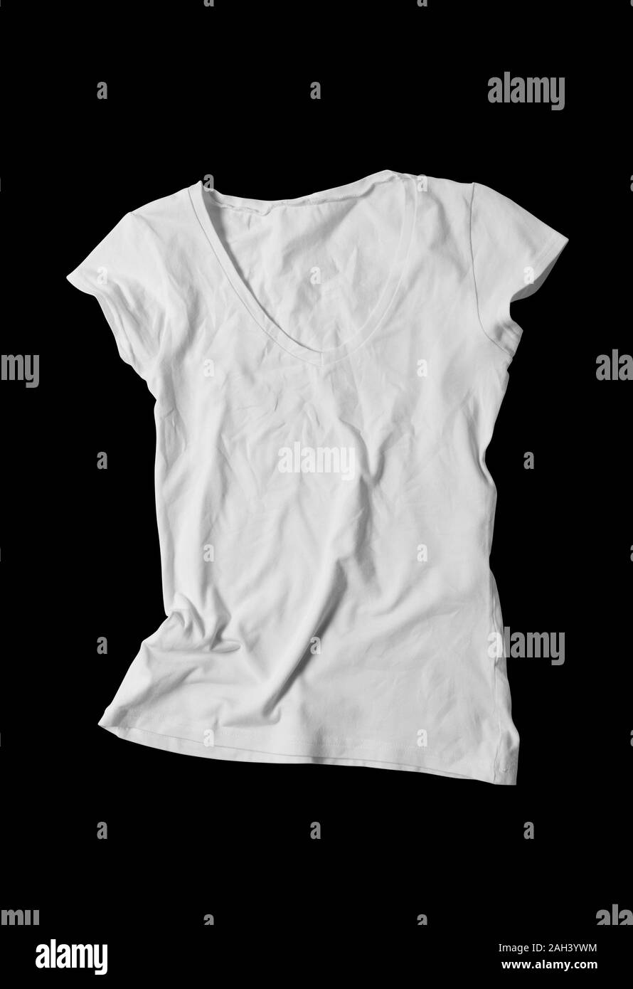 Blank white women's t-shirt on black cut background. Mock-up. Stock Photo