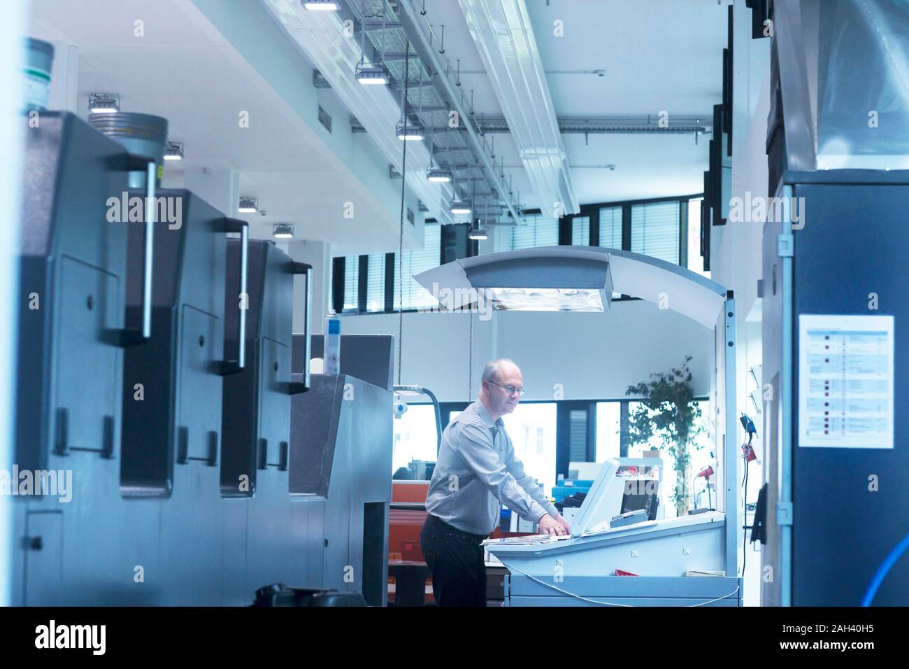 Manager working in printing house Stock Photo