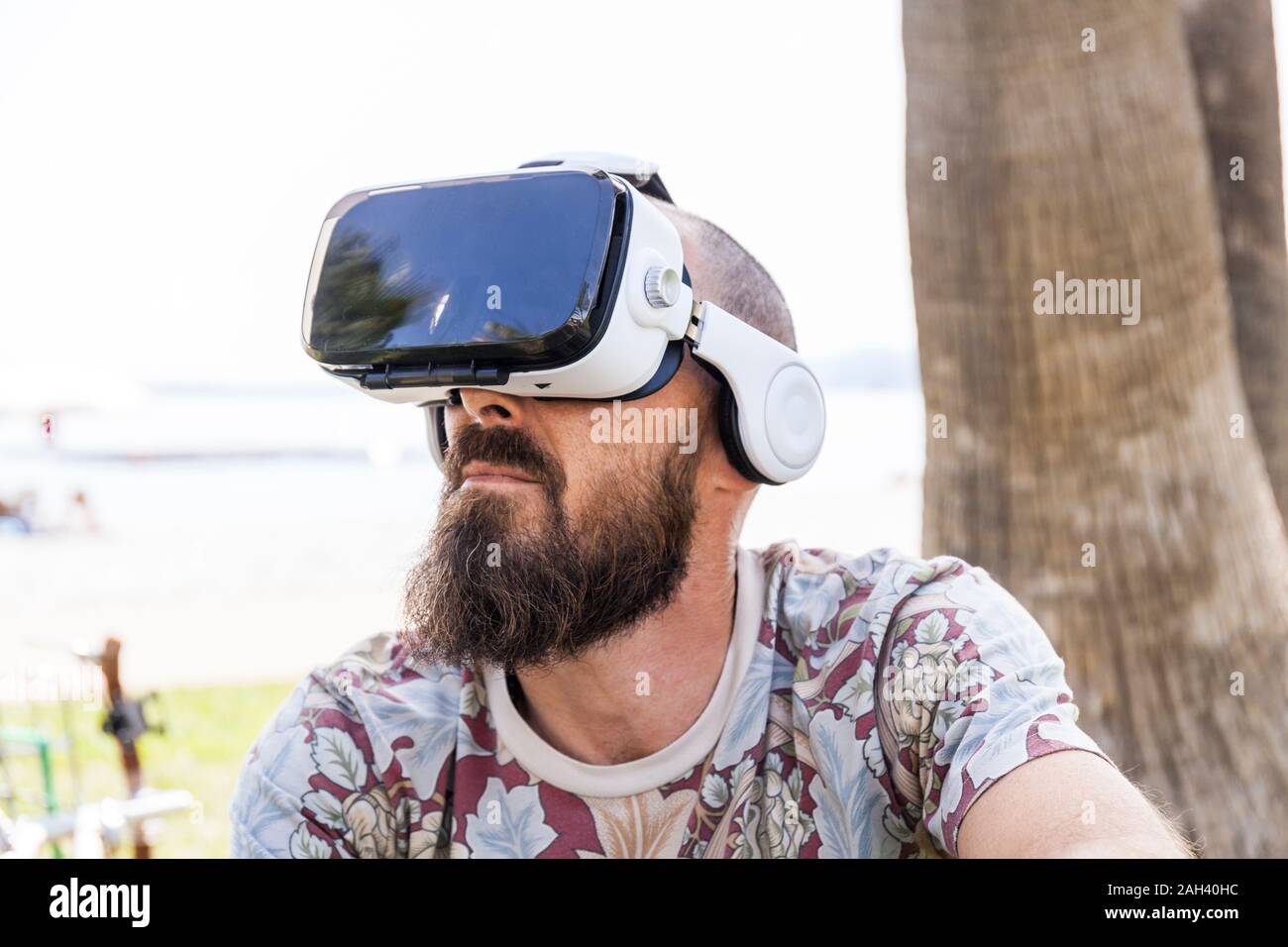 Mature man with virtual reality glasses Stock Photo