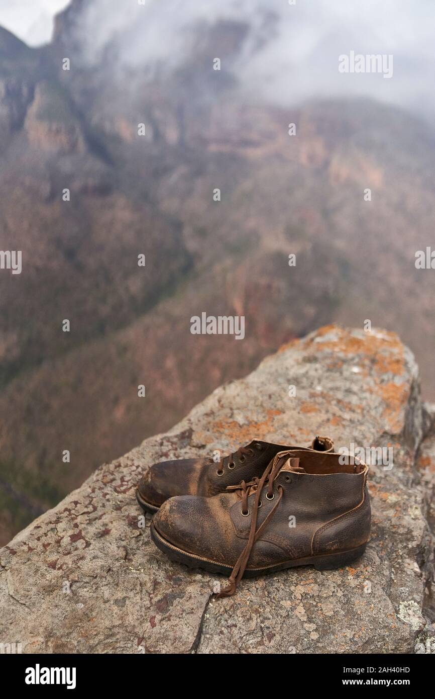 Pair of vintage boots on the top of a hill, Blyde River Canyon, South Africa Stock Photo