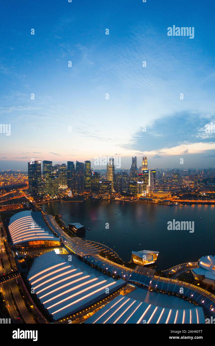 Singapore, Aerial view of Singapore Marina bay at dusk Stock Photo