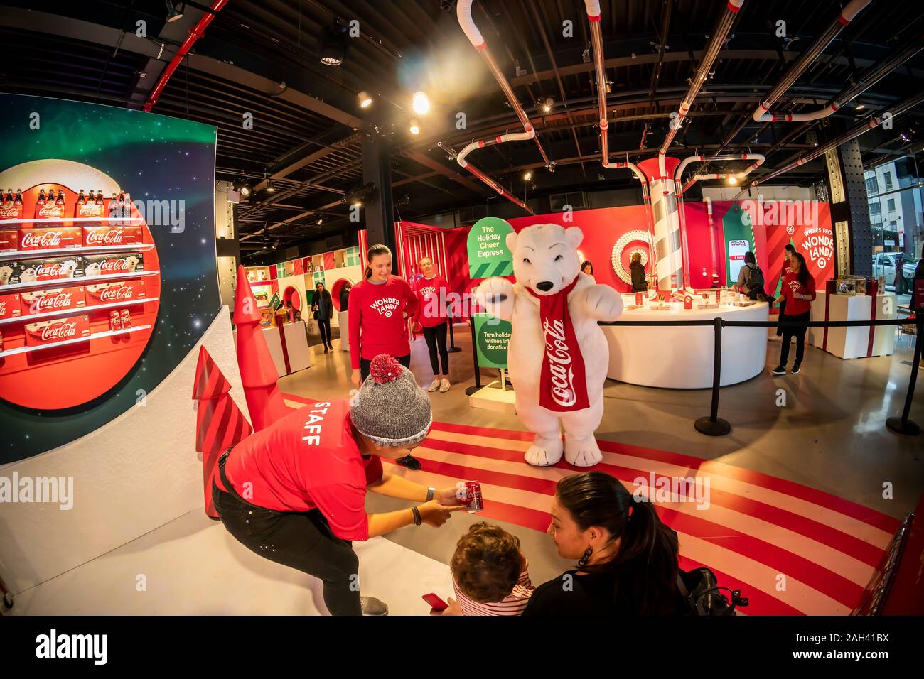 A brand ambassador wears a polar bear costume at the Coca-Cola brand activation at the Target "Wonderland!" pop-up store in the Meatpacking District in New York on its grand opening day, Friday, December 13, 2019. The pop-up, featuring numerous instagrammable moments as well as product experiences, is open until December 22. (© Richard B. Levine) Stock Photo