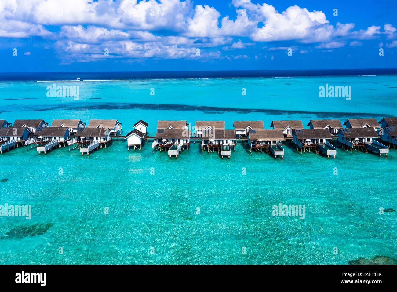 Maldives, South Male Atoll, Kaafu Atoll, Aerial view of Bungalows on sea Stock Photo