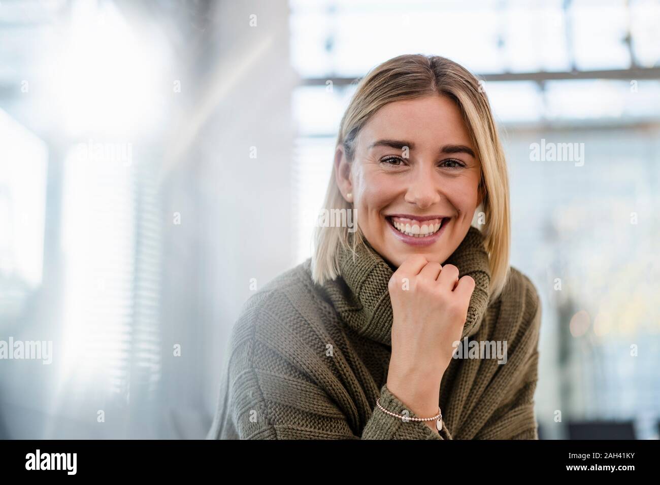 Portrait of a happy young woman Stock Photo