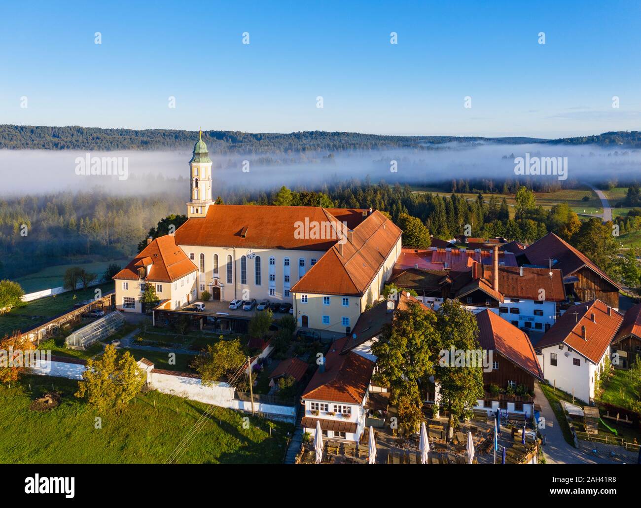 Germany, Bavaria, Upper Bavaria,Toelzer Land, Sachsenkam, Aerial view of Reutberg Monastery Stock Photo