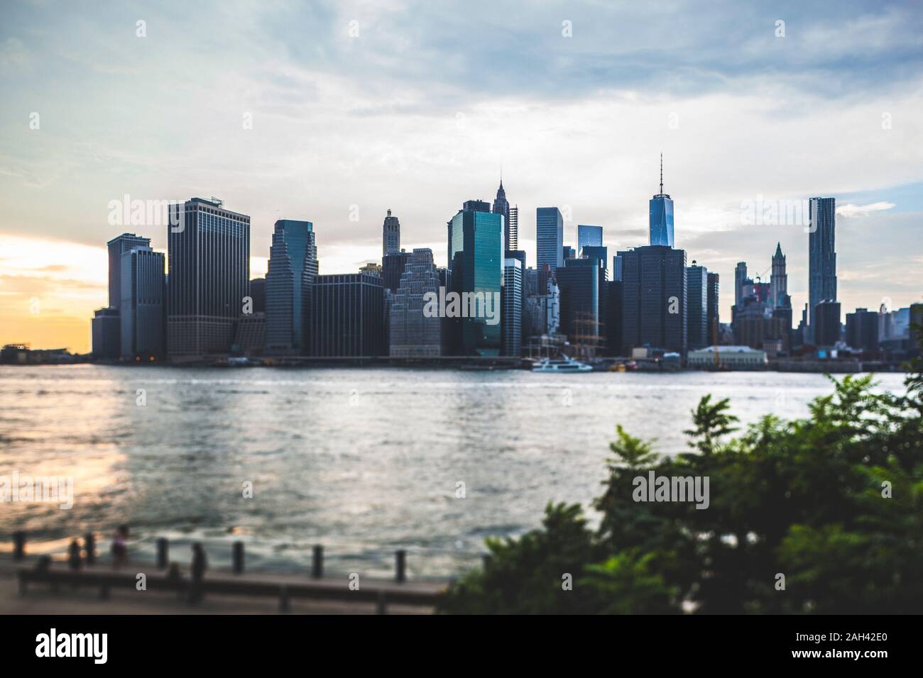 USA, New York, New York City, Manhattan skyline at sunset Stock Photo