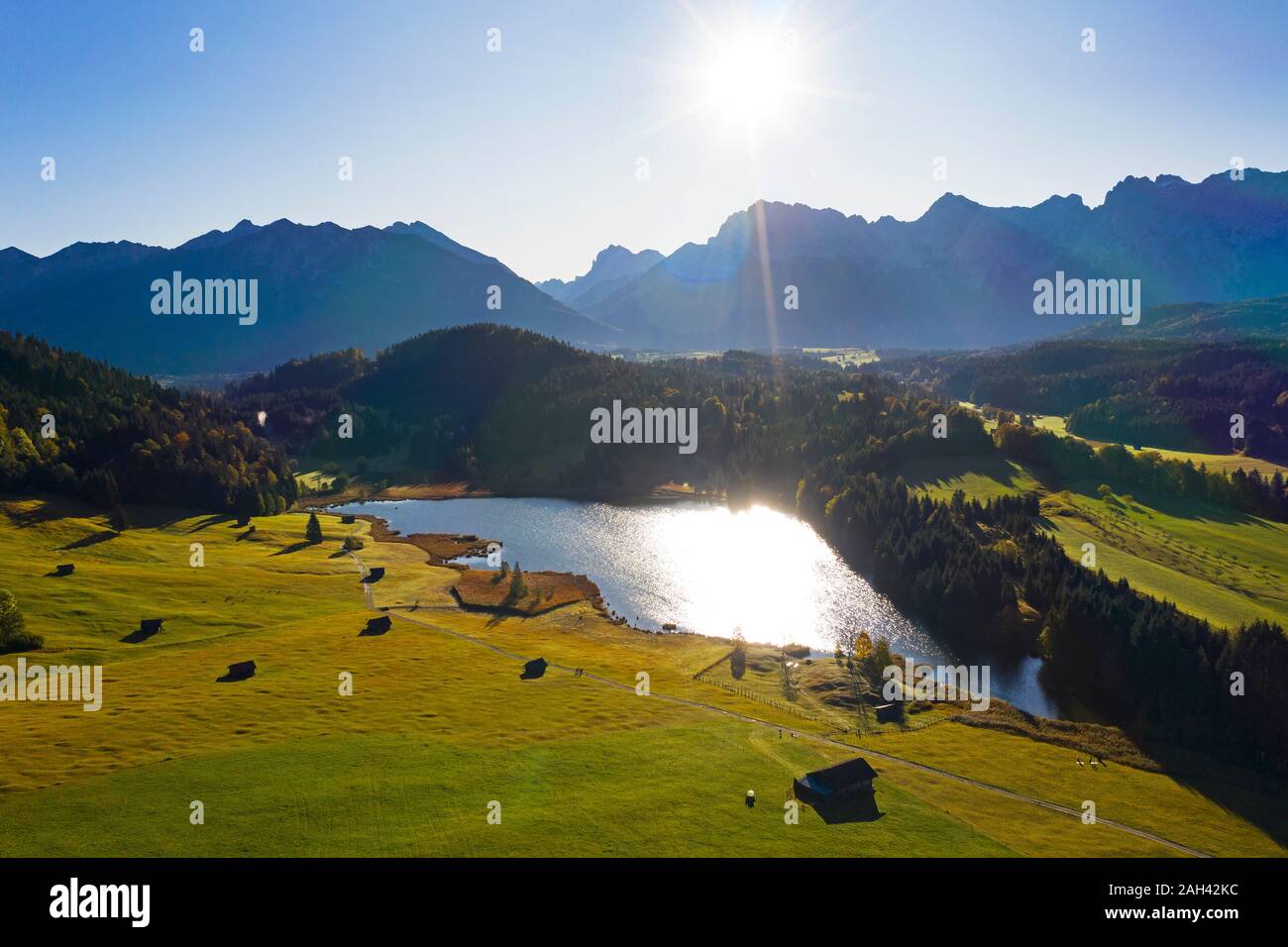 Germany, Bavaria, Krun, Scenic view of sun shining over Geroldsee lake Stock Photo