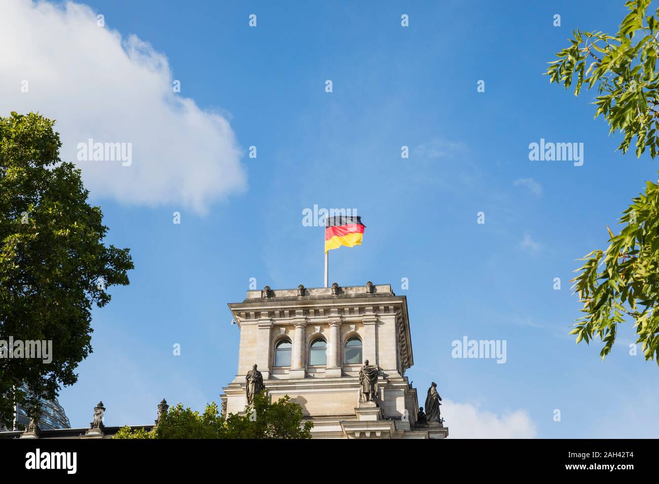 Germany, Berlin, German flag on top of Reichstag building Stock Photo