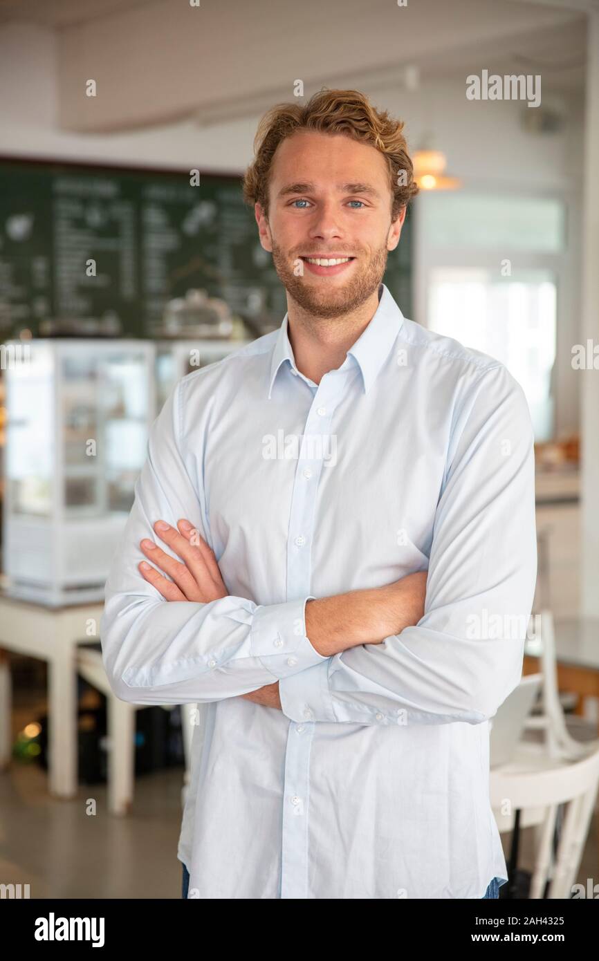 Young businessman in a cafe Stock Photo
