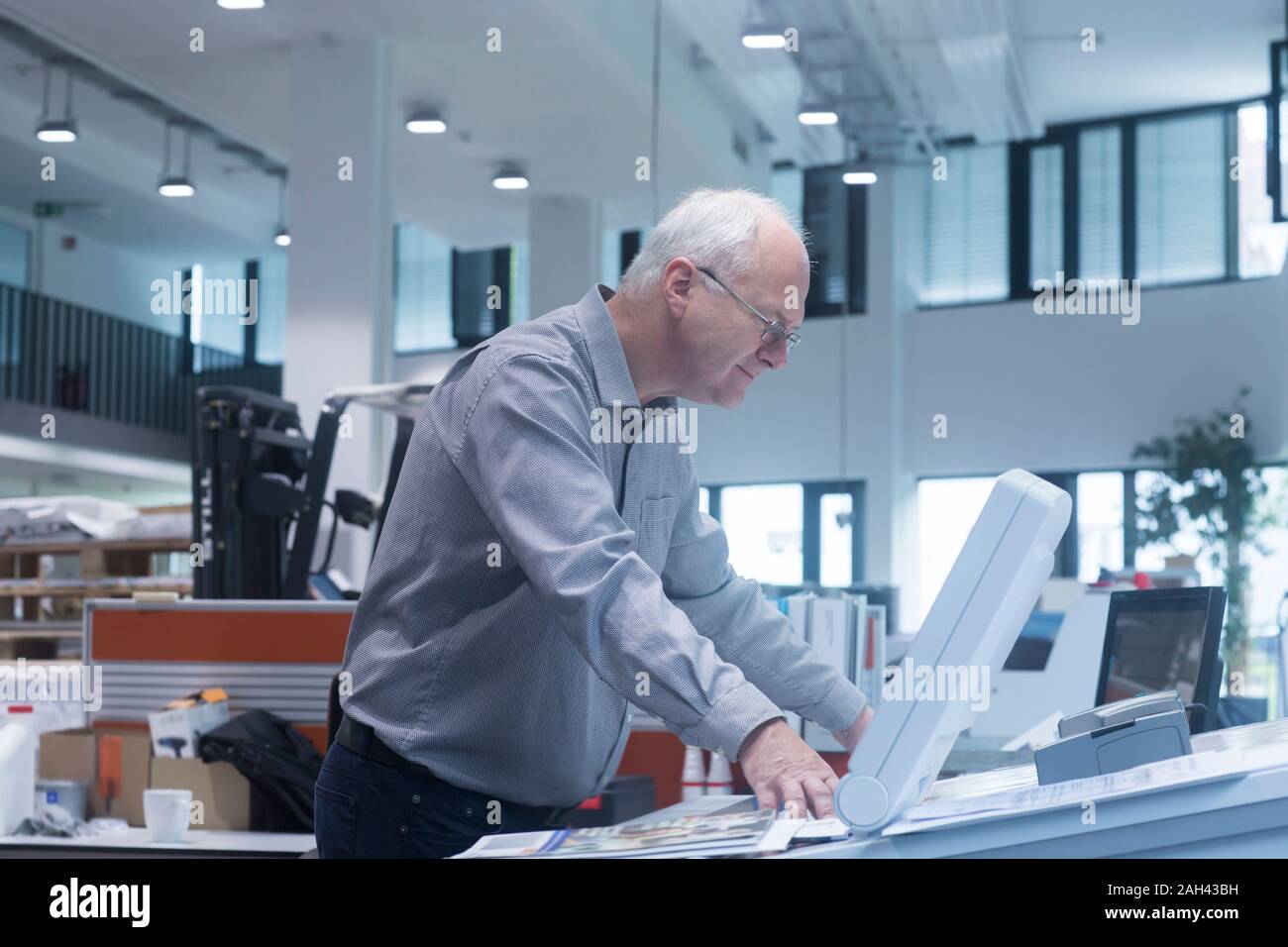 Manager working in printing house Stock Photo
