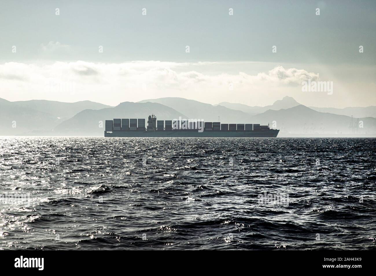 Spain, Andalucia, Tarifa, Freight ship in Strait of Gibraltar Stock Photo