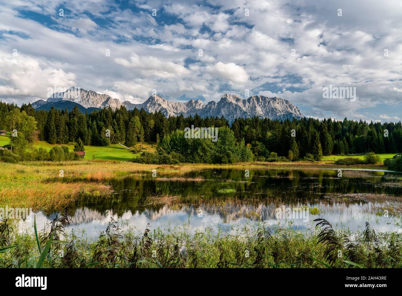 Germany, Bavaria, Scenic view of Tennsee lake with Wetterstein Mountains in background Stock Photo